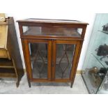 Inlaid mahogany glazed display cabinet with integral display counter