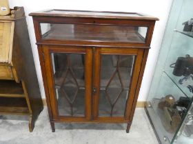 Inlaid mahogany glazed display cabinet with integral display counter