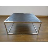 Modern low-level chrome framed coffee table with parquet type surface