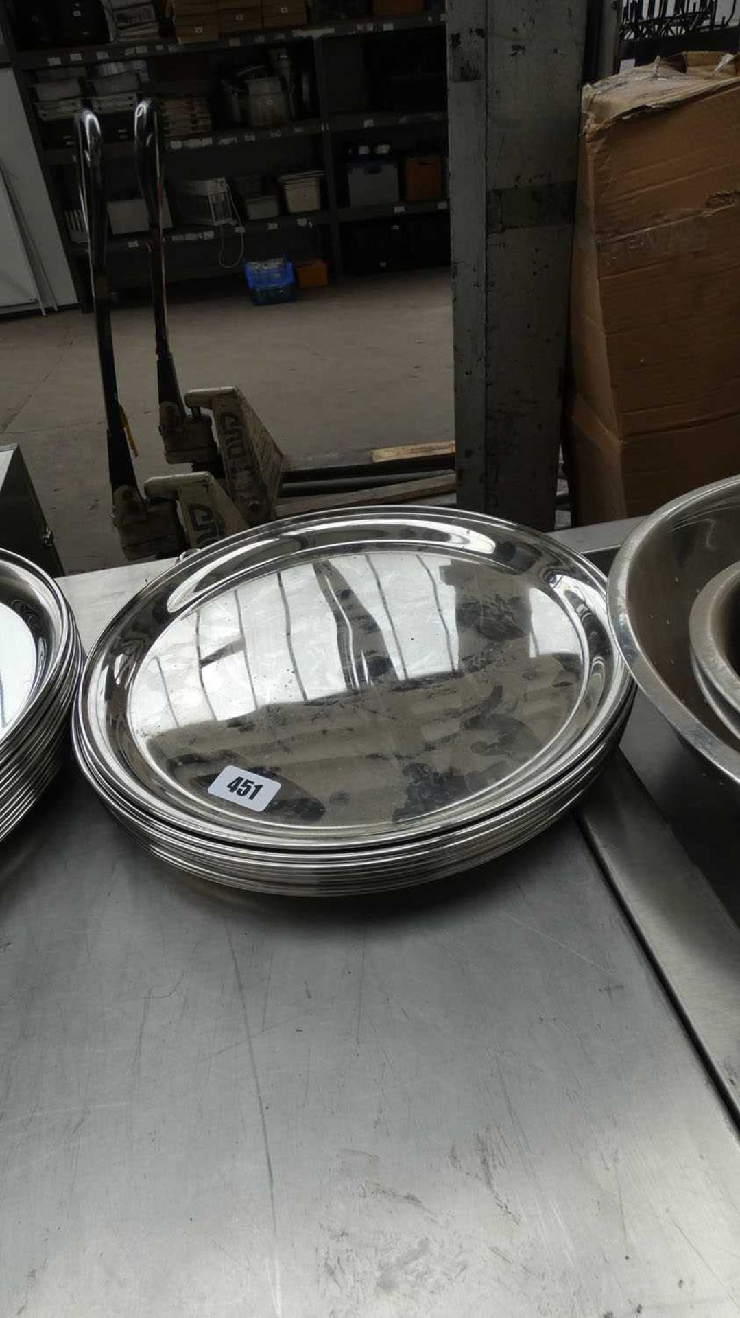 Small stack of 35cm round metal serving trays