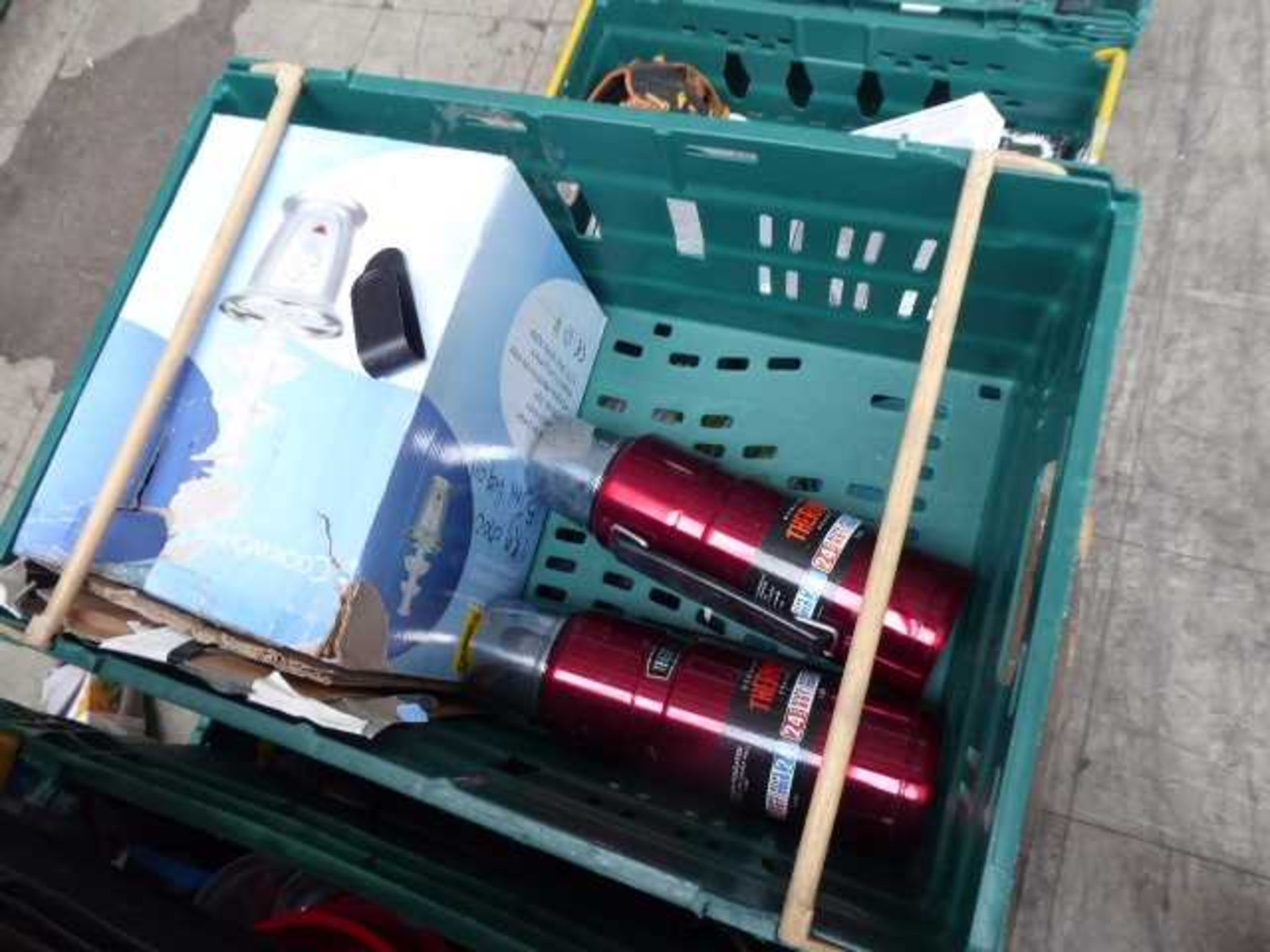 2 x trays containing two thermos flasks, a chocolate fountain and some crockery