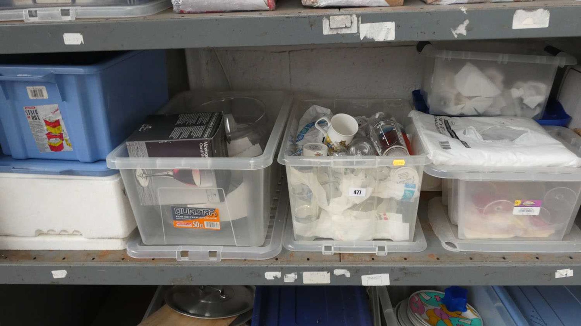 Shelf of assorted glassware