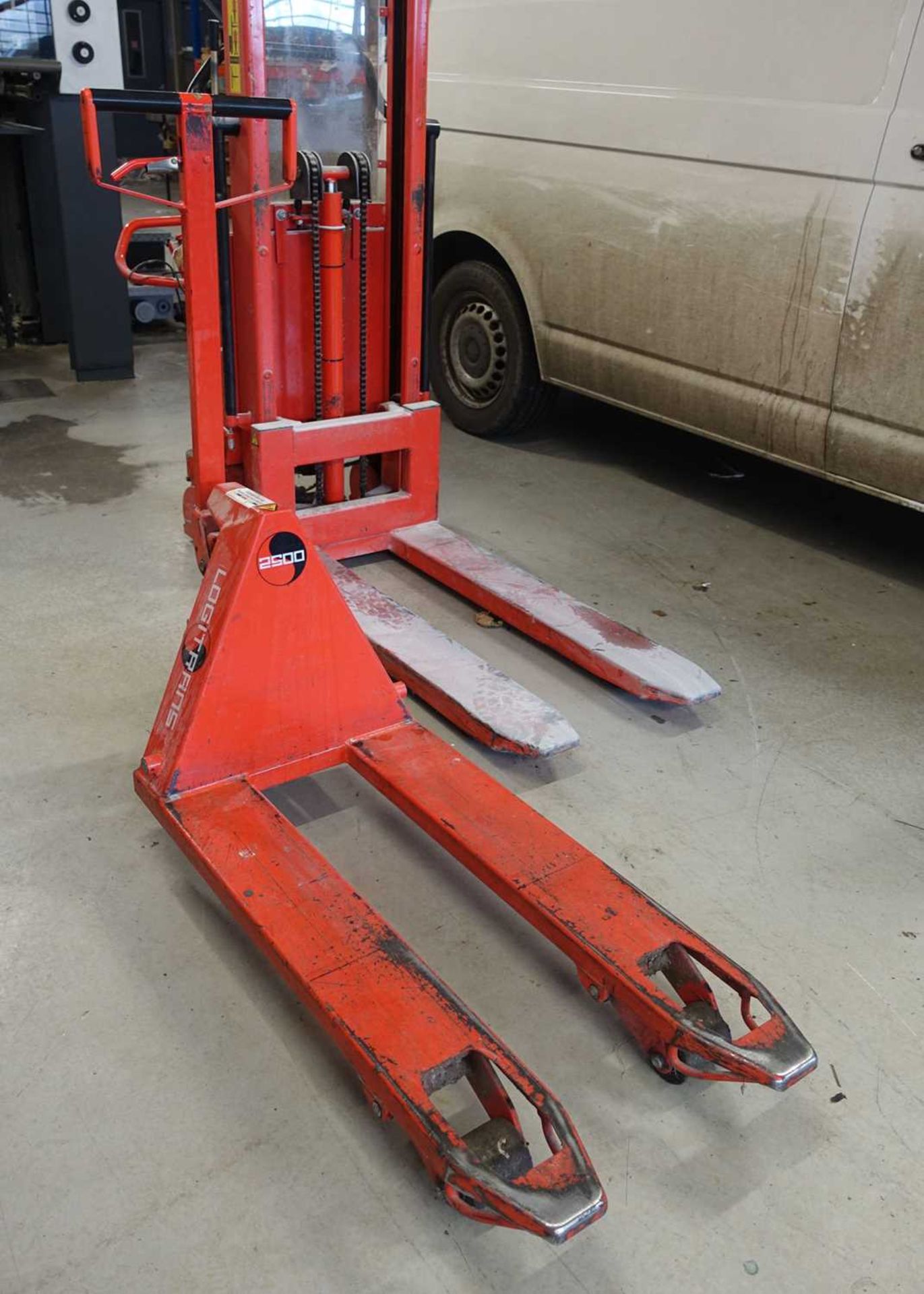 +VAT Logitrans red pallet truck. 2500kg capacity