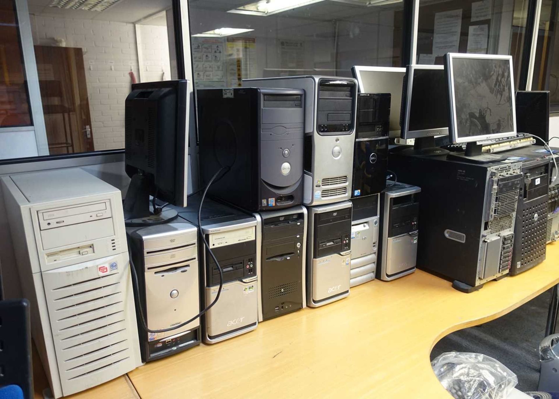 +VAT 15 assorted PC and server towers with 5 assorted monitors
