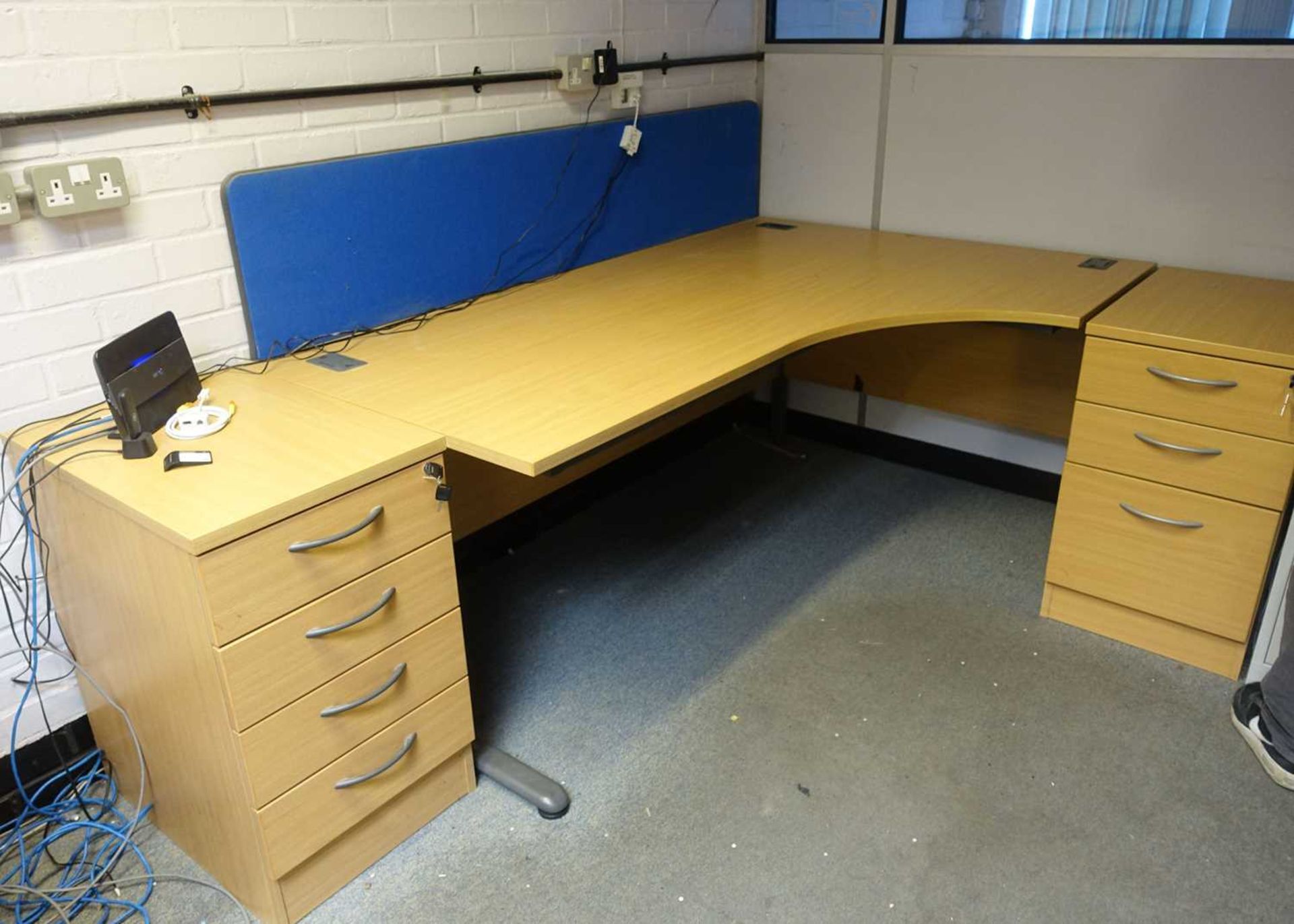 +VAT The remaining furniture contents of the front office to include; 5 light oak radial desks (