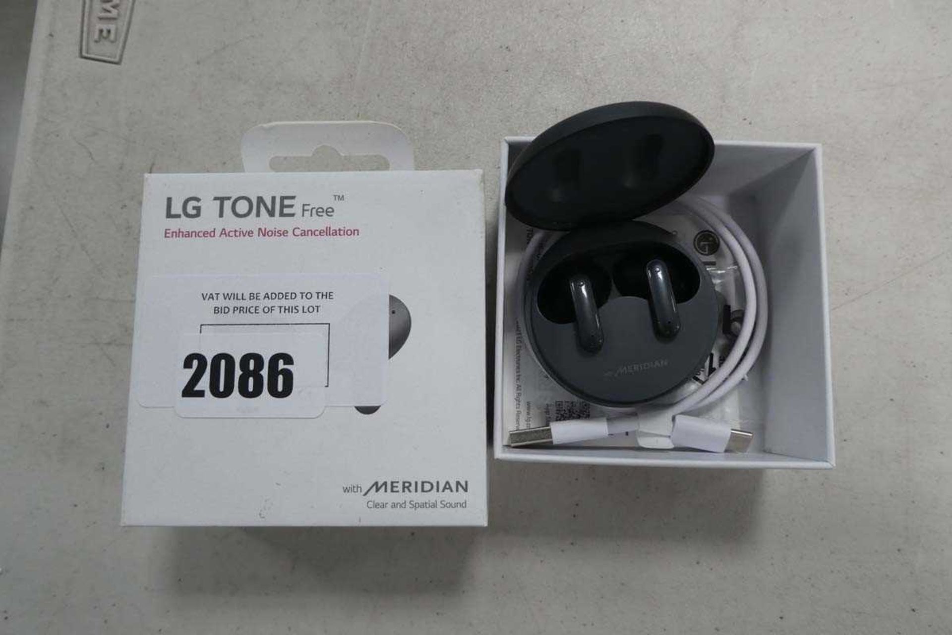 +VAT LG Tone Free wireless earbuds in box with charging case