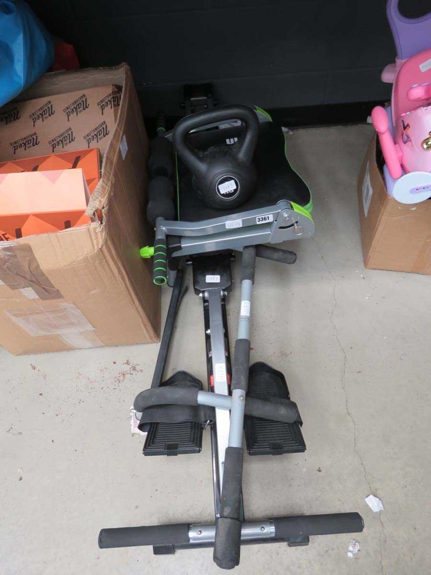 Fold out rowing machine and ab trainer