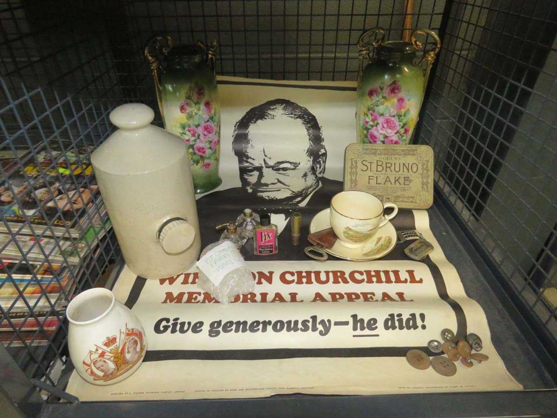 Cage containing buttons, Winston Churchill memorial appeal poster, foot warmer, rose patterned
