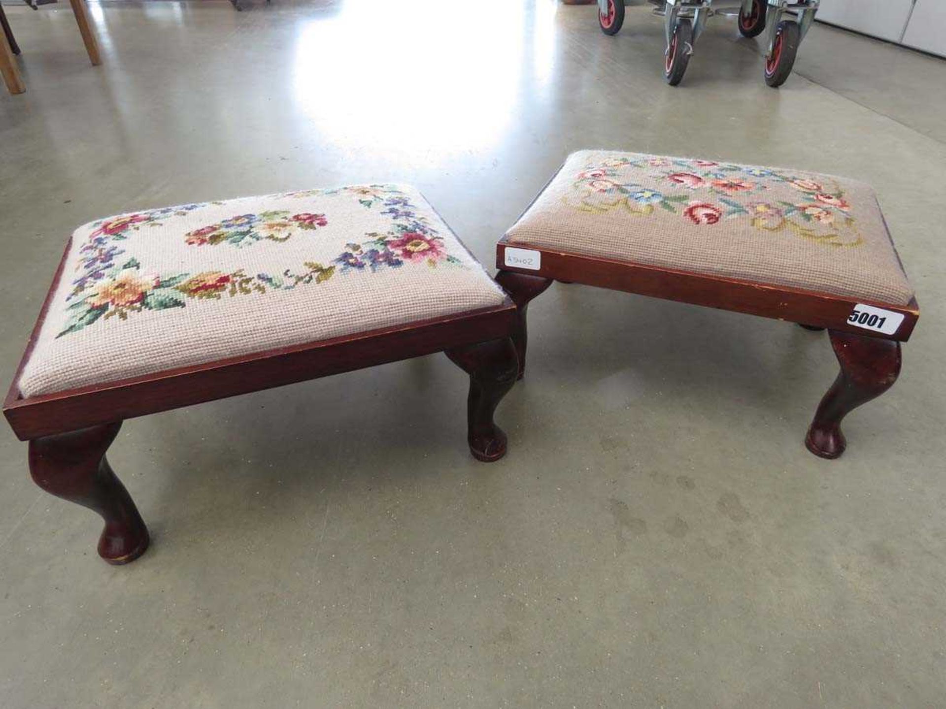 Pair of embroidered footstools