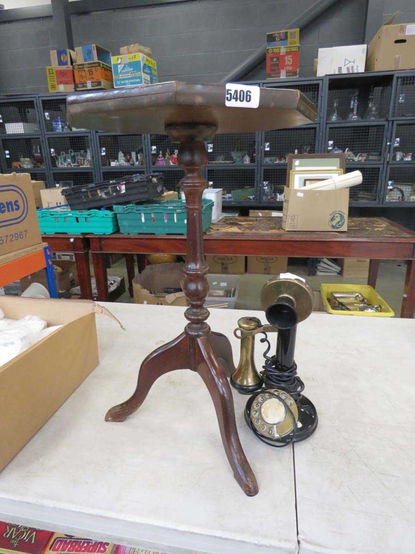 Reproduction tripod wine table plus a candle stick telephone