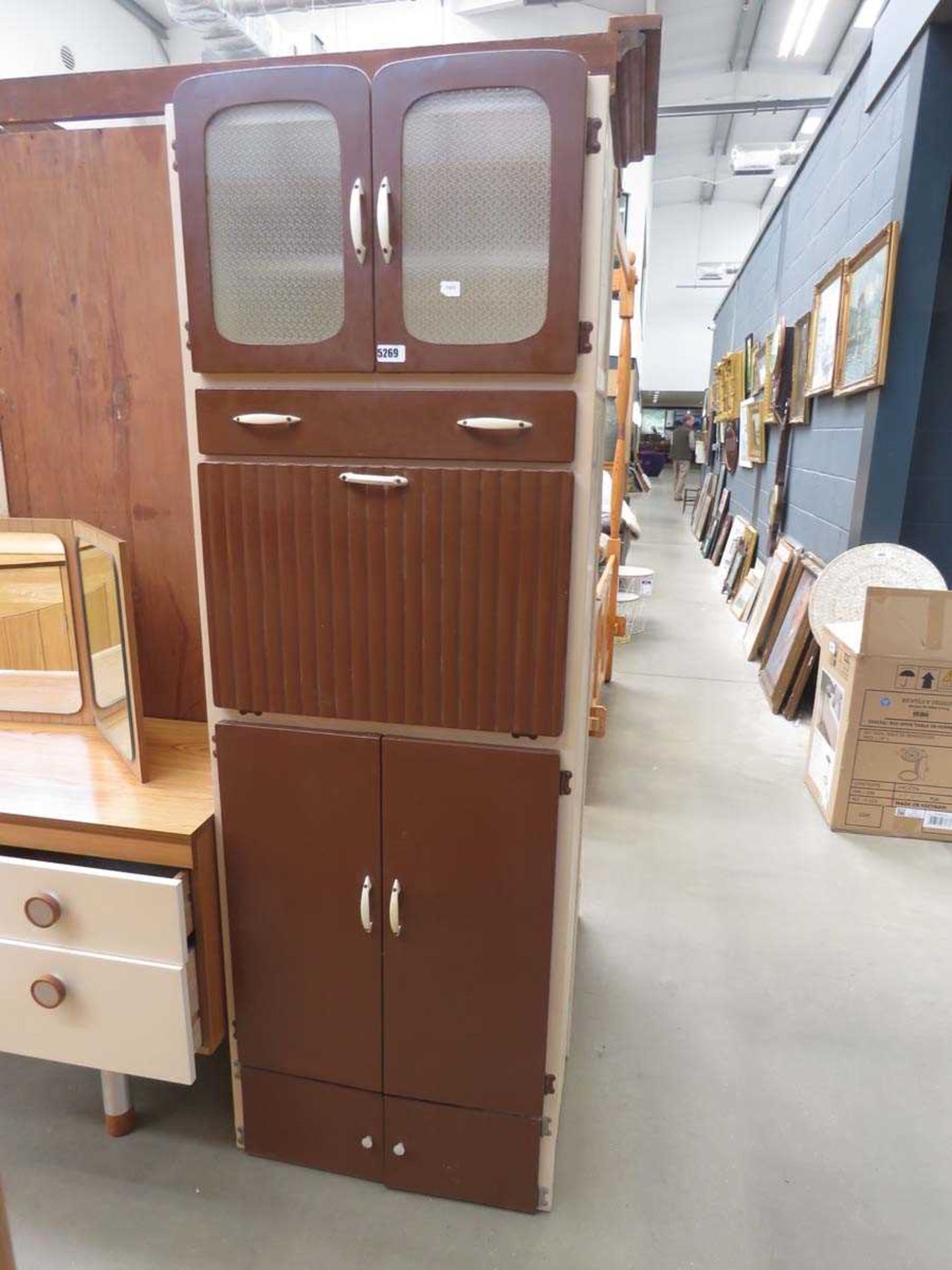 Chocolate brown painted pantry cupboard