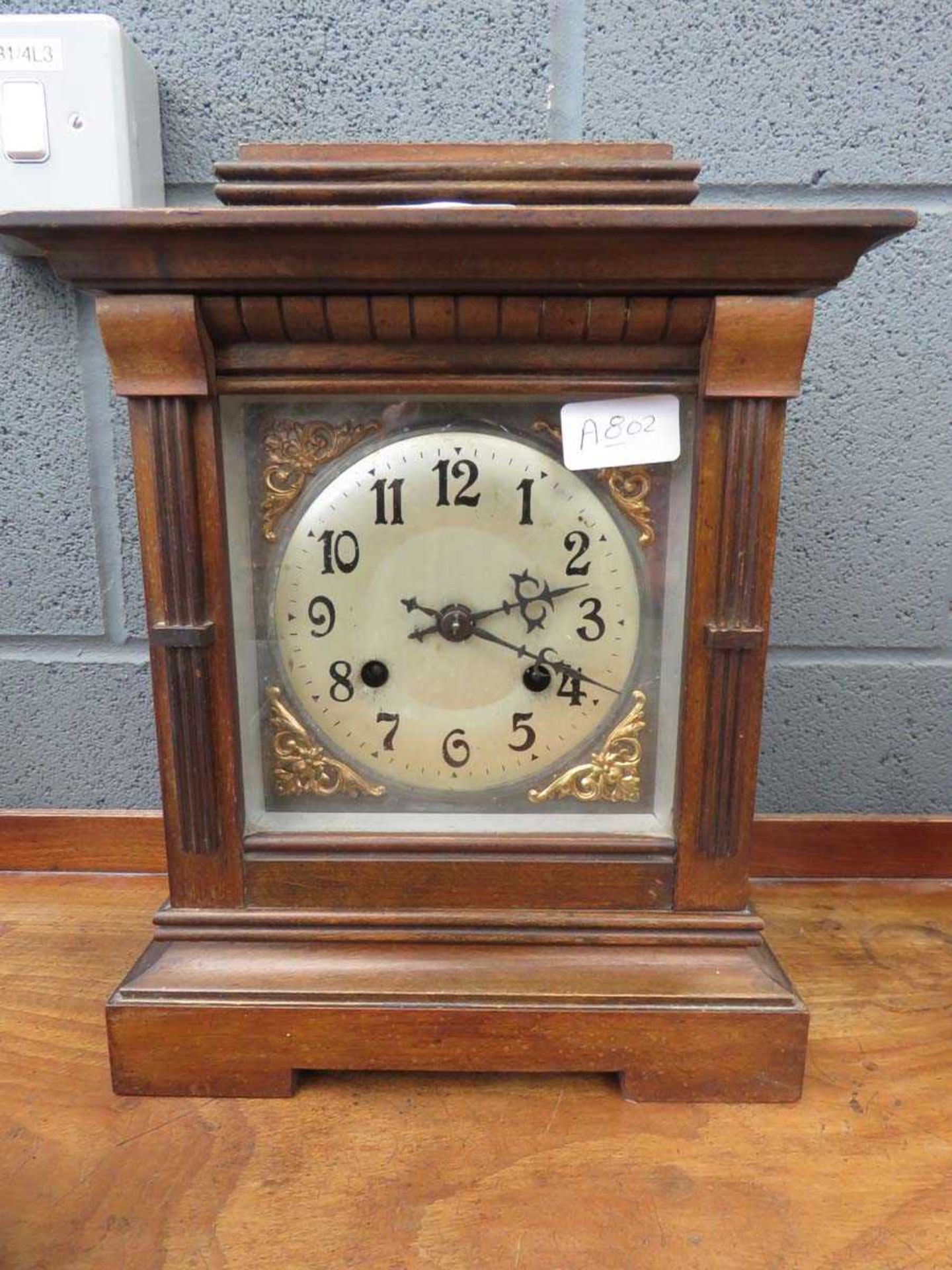 Bracket clock in mahogany case