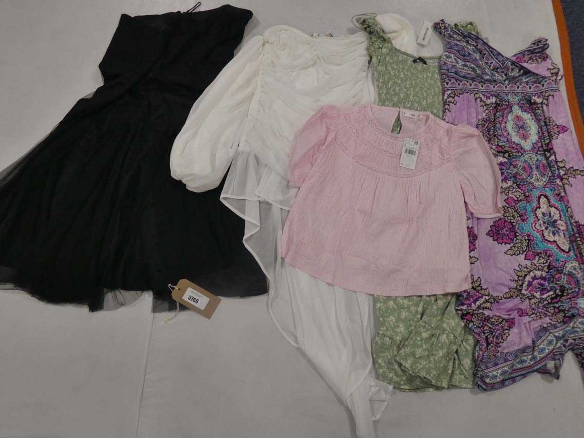 +VAT Bag containing dresses and top from Monsoon, Boohoo, Urban Outfitters and Mango