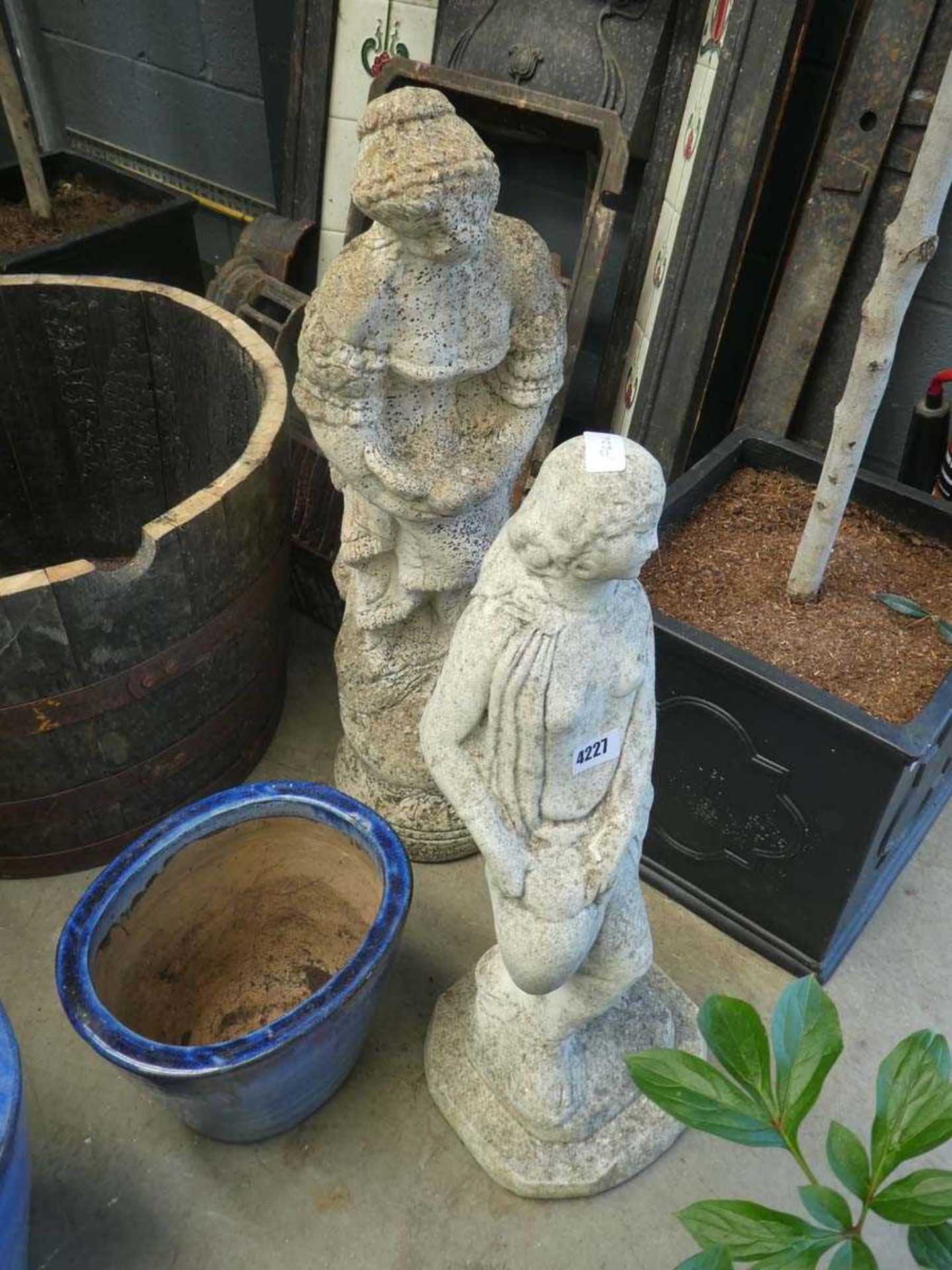 2 small garden statues of ladies