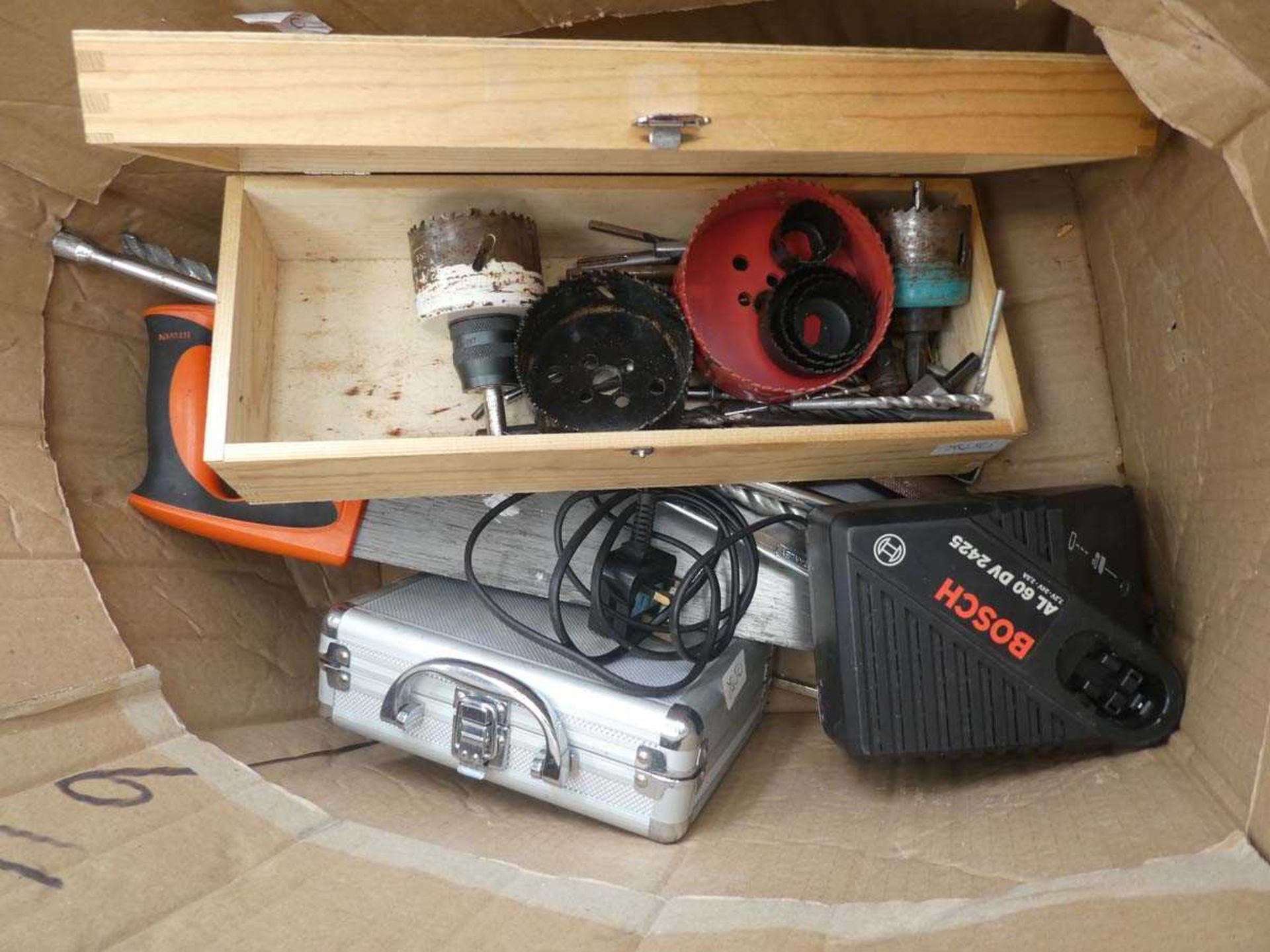 Box containing saw, files, drill bits, hole saws, Bosch battery charger etc.