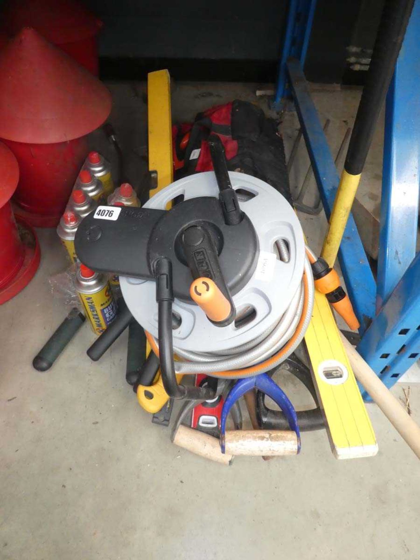 Small quantity of tools, inc. camping gas bottles, hose reel, spirit levels, fork, etc.