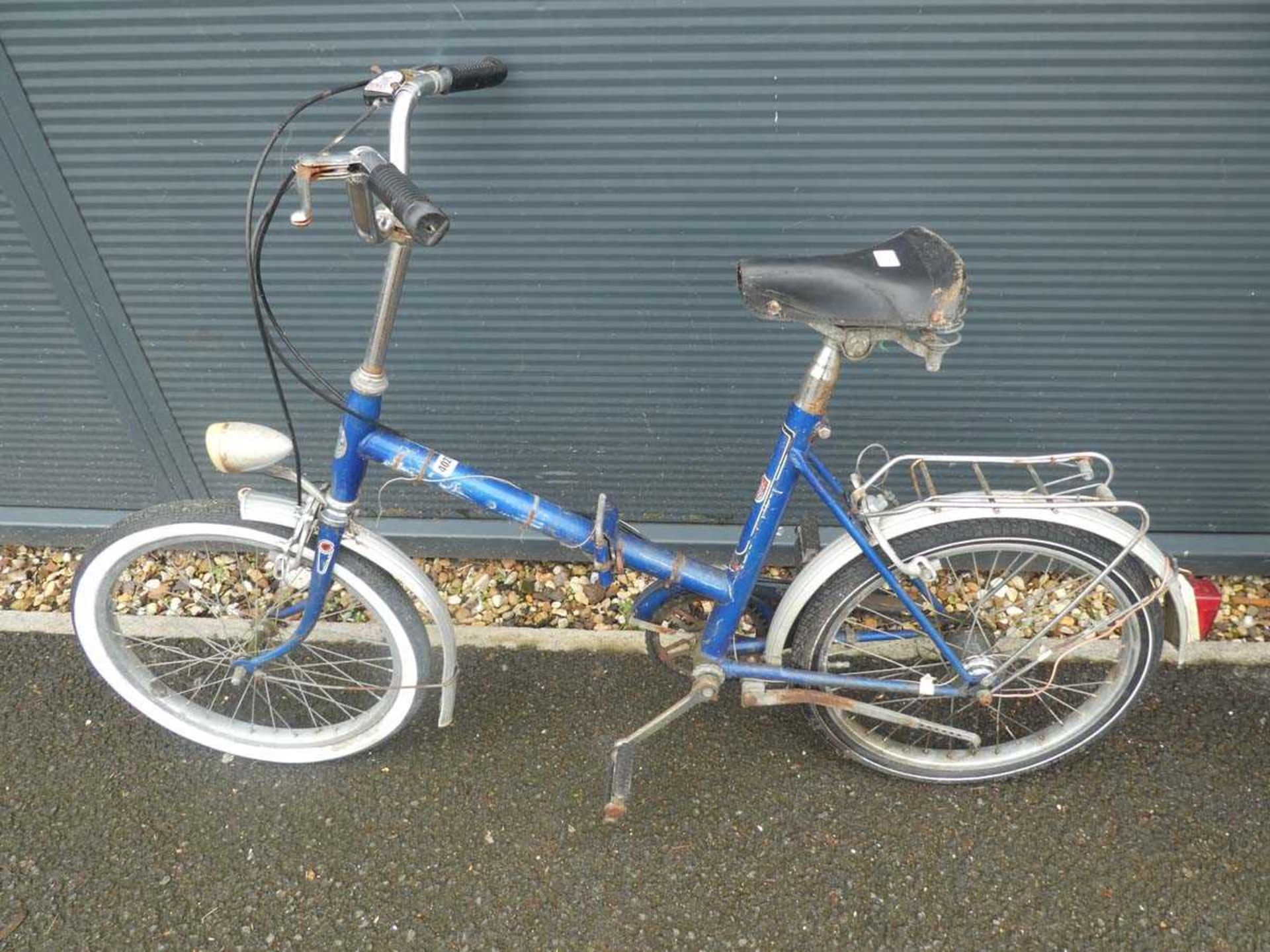 Vintage fold up blue bike