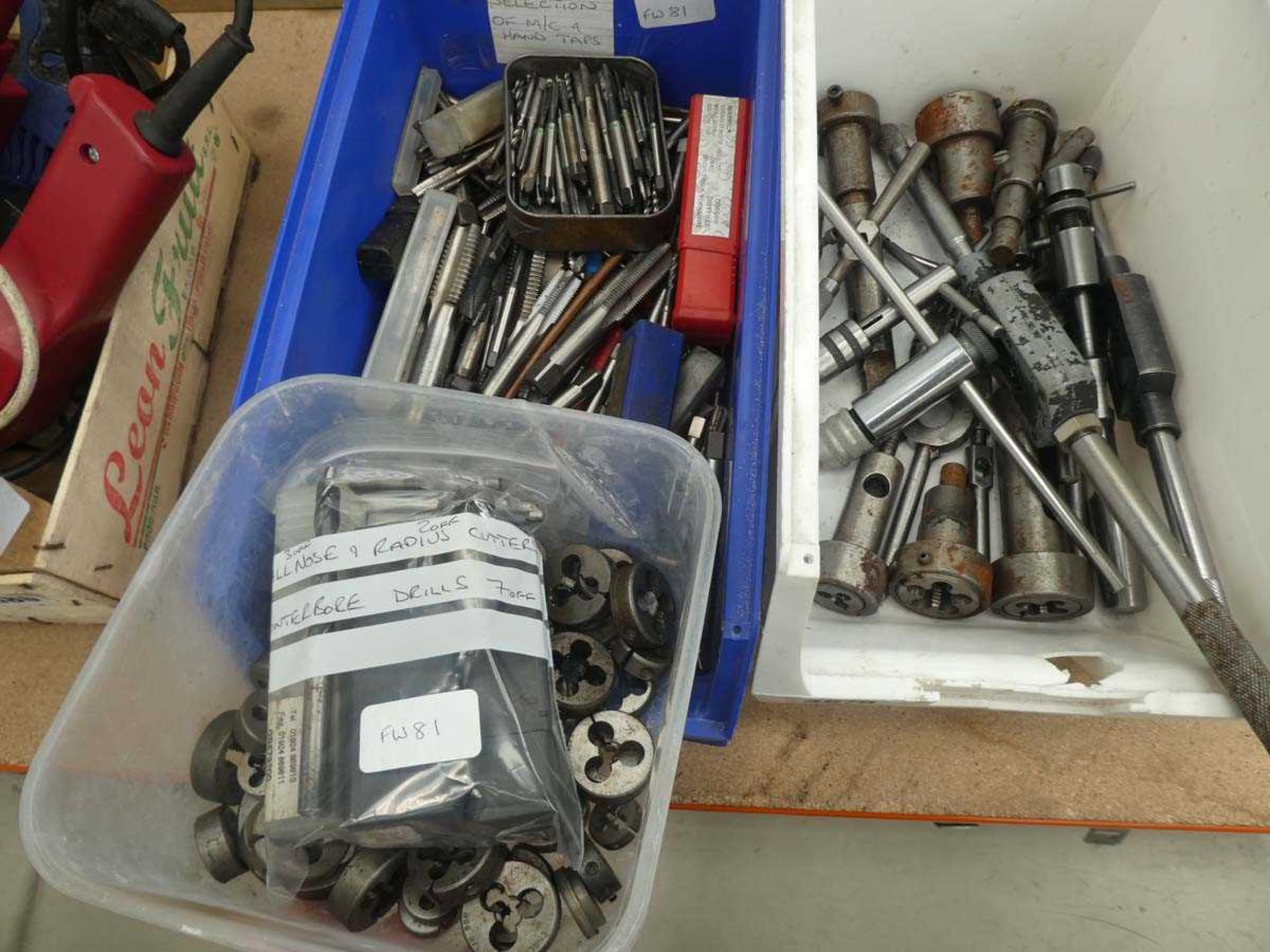 3 boxes containing taps, dies and tap and die holders