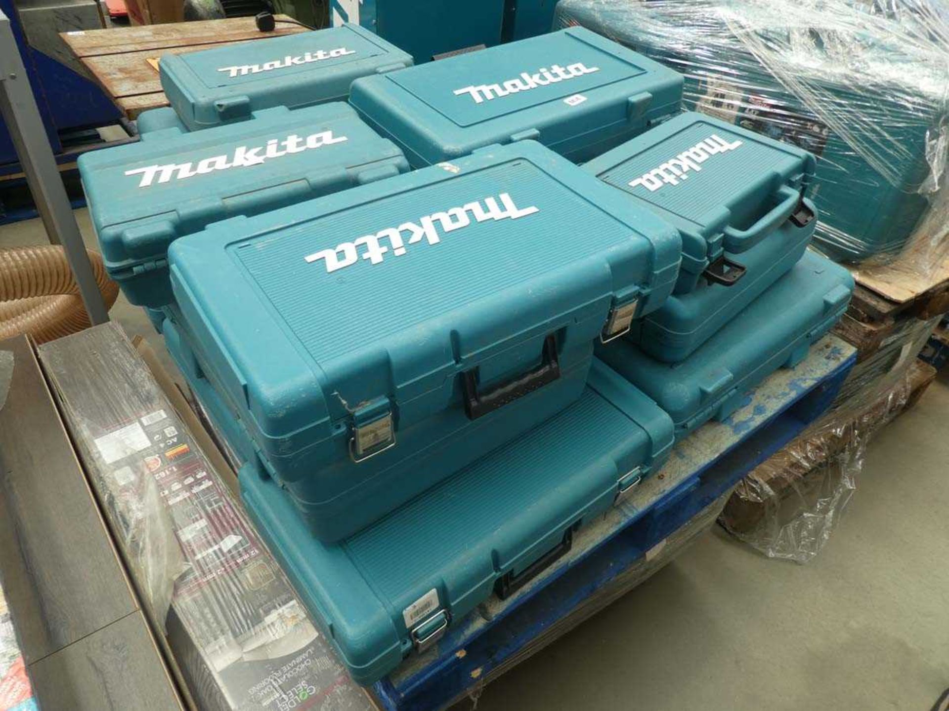 Two pallets of empty Makita tool cases