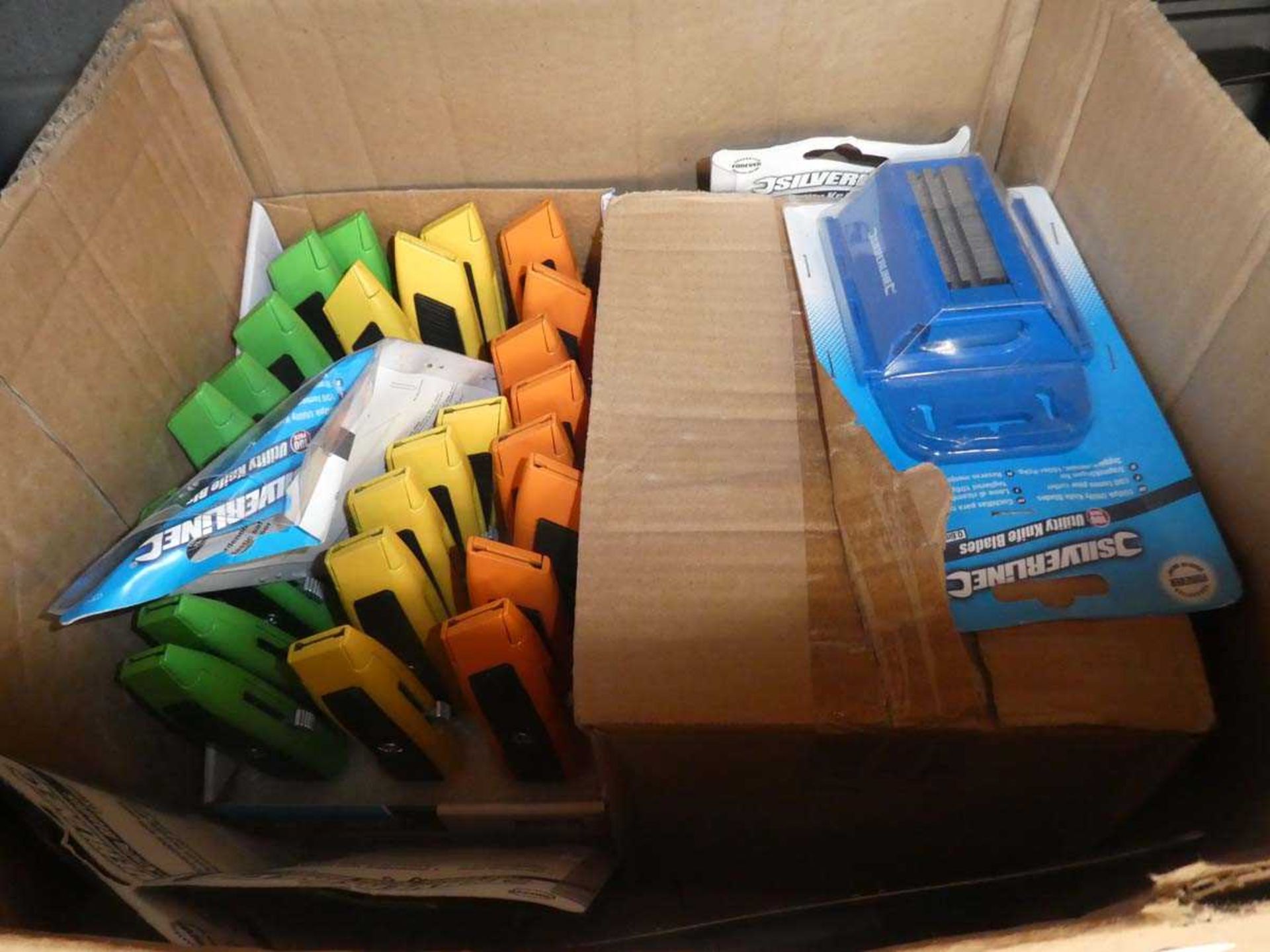 Box containing utility knife blades and Stanley knife blades