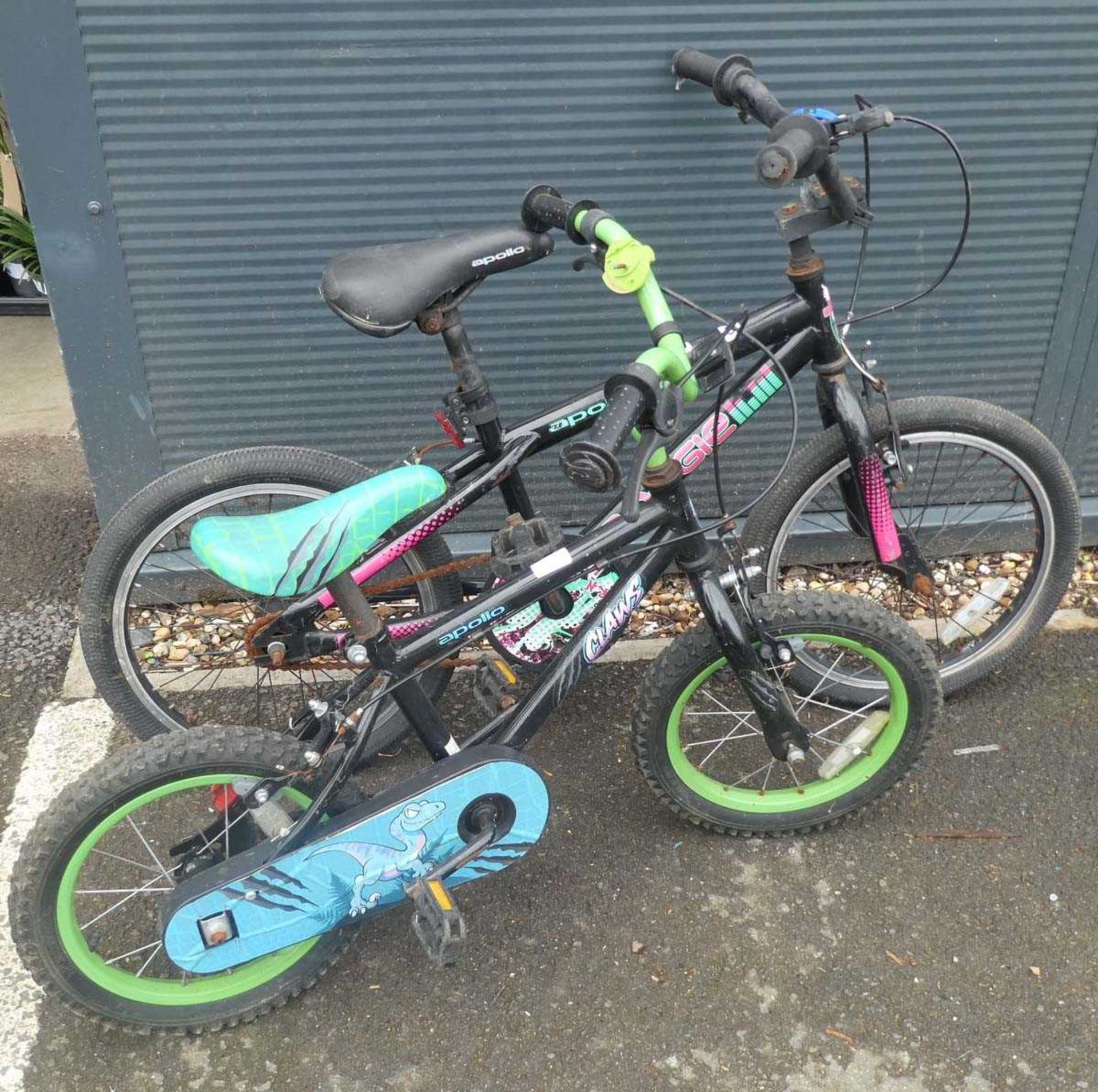 2 small childs bikes in black