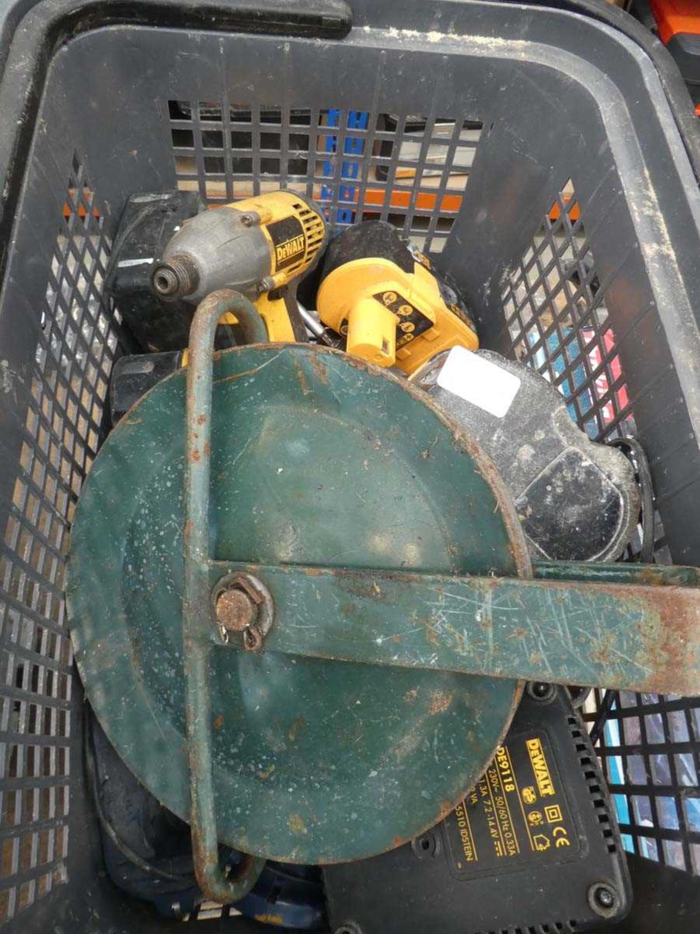 Crate containing battery tools and batteries and a hoist