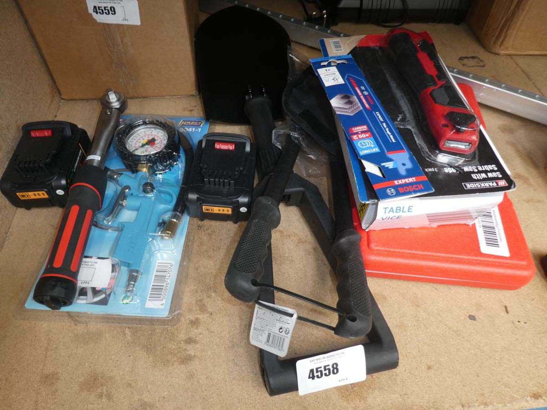 +VAT Quantity of items including torque wrench, battery, tyre inflator, two fold up shovels, sabre