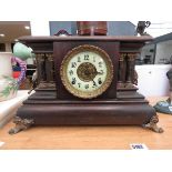 Mantle clock with Corinthian columns to the side