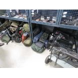 Large quantity of fishing tackle to include trollies, box seats, rods, cases, beds , landing mats,