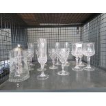 Cage containing champagne flutes and wine glasses