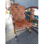 Rocking chair with floral patterned seat