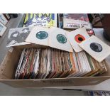 Box containing 7" vinyl records