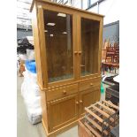 Glazed oak display cabinet with cupboard base under