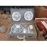 Picnic case with a quantity of melamine crockery