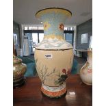 Floral and bird decorated vase