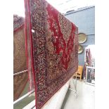 Floral carpet with red background and central medallion