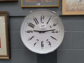Wall clock in the shape of a drum