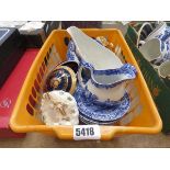 Box containing blue and white crockery and a studio pottery vase