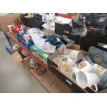 4 boxes containing Poole dolphins, commemorative ware, ornamental figures, money boxes and a novelty