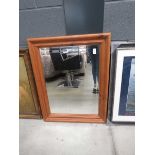 Rectangular bevelled mirror in pine frame