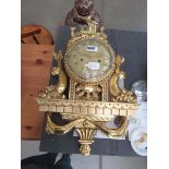 Ornate wall clock with Viking longboat finial