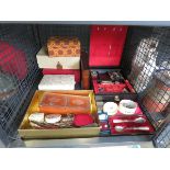 Cage containing a pot lid, loose cutlery, costume jewellery and jewellery boxes