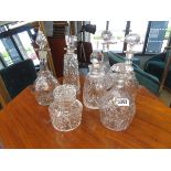 6 decanters plus a lidded jar