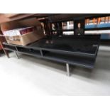 Low slung hi-gloss coffee table