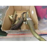 Box containing brass alligator, nutcrackers and a fox