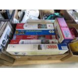 Box containing jigsaw puzzles