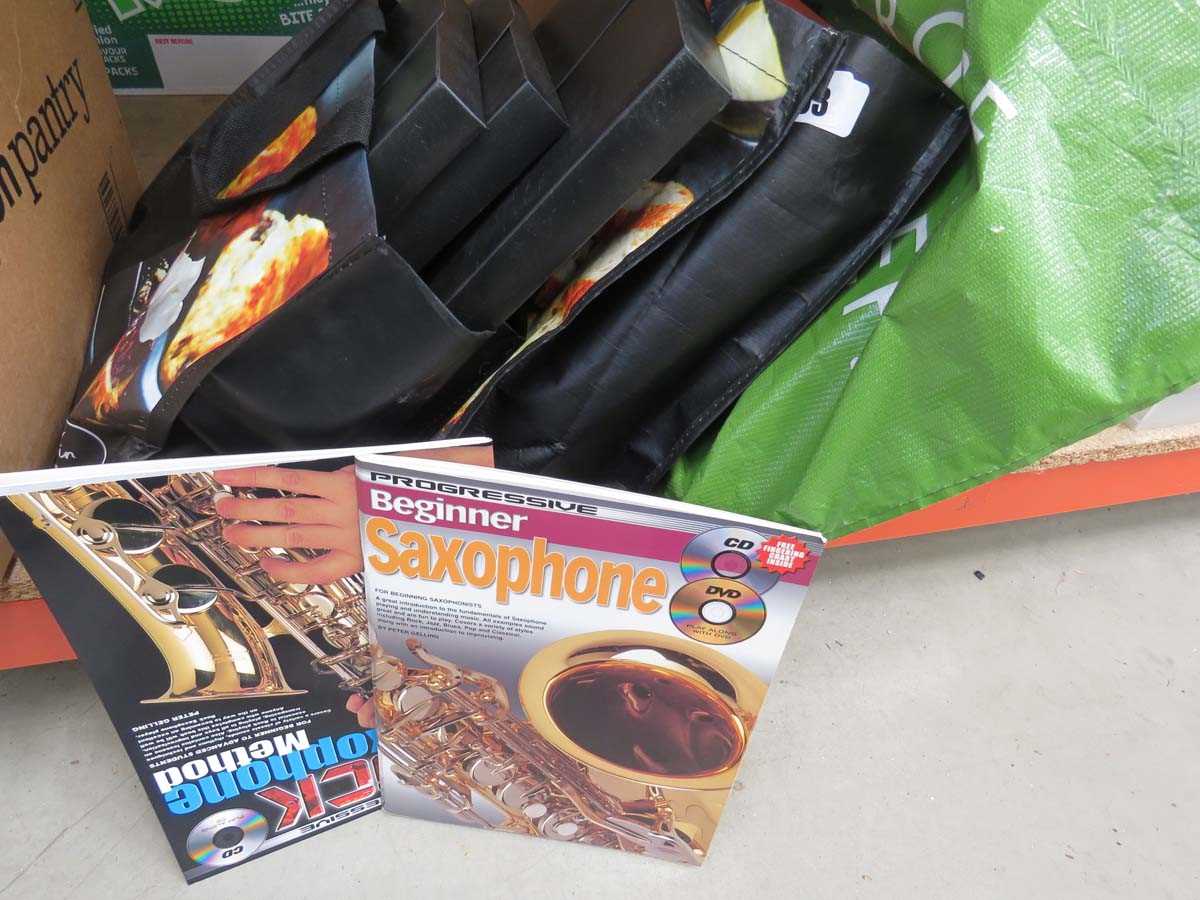 3 bags containing gardening and music books and magazines