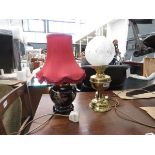 Brass table lamp plus pottery lamp with red fabric shade