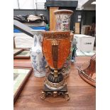 Amber resin urn plus two floral decorated vases