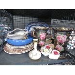 Cage containing blue and white platter, rose patterned vases, ornamental posies and general